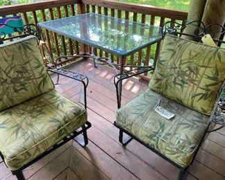 Glass top patio table and chairs