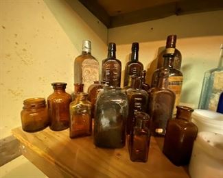Some of the numerous old bottles that were collected