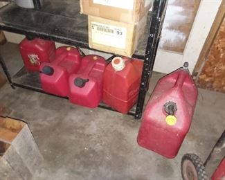 5assorted gas cans