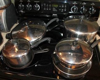 #40 - Kitchenware Lot - assortment of pots / pans and kitchen utensils - Farberware, Revere Ware, cast iron skillet, and more!