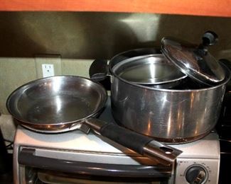 #40 - Kitchenware Lot - assortment of pots / pans and kitchen utensils - Farberware, Revere Ware, cast iron skillet, and more!
