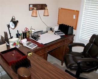 #44 - Office Desk Lot - includes wood desk, table, rolling chair, chair mat, lamps, paper shredder, desk accessories, and office supplies