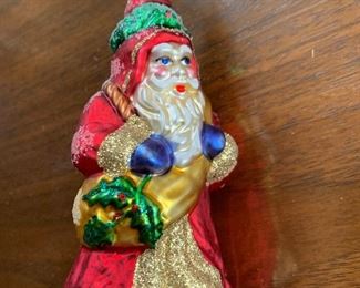 Christopher Radko Santa with cold Bag and Holly $14.00