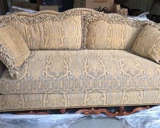 Lovely Southminster Sofa in beige and gray with detailed wood 