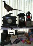 Antique clocks, cast iron doorstops, bookends