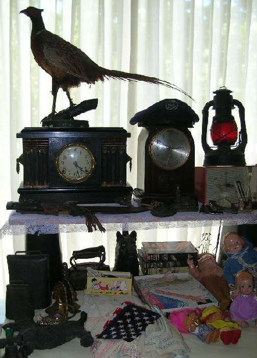 Antique clocks, cast iron doorstops, bookends