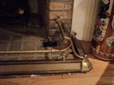 Unusual and beautiful fireplace fender
