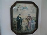 Antique religious picture in a beautiful frame depicting angels, heaven, Mary, Joseph, and Jesus.