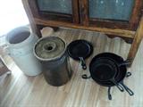 Churns and iron skillet with a lid (we have a lot of iron skillets in different sizes!