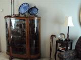 Mint condition --- beautiful oak curved (bow) front china/display cabinet.