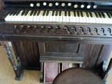 More pics of the reed organ --- you can see the pedals to pump!