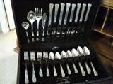 Silver flatware in original box.
