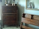 Five drawer antique chest with glove box on top.  Full size headboard - 1950's and large mirror.