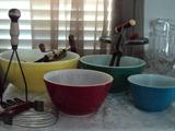 Vintage pyrex mixing bowl set (4 bowls in graduated sizes).  (Yellow, green, red, and blue).  Old hand beaters (mixer), vintage potatoe masher, and pastry cutter with wooden handles!