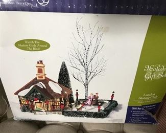 A dozen Christmas Village Sets