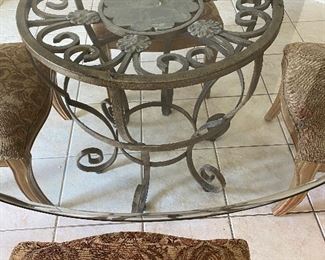 BEVELED GLASS ROUND TABLE WITH DECORATIVE METAL BASE