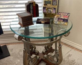 ROUND BEVEL GLASS TABLE WITH DECORATIVE METAL BASE