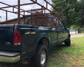 Lot # 40 $5500 ~ Ford F250 '99 4X4 - 4 wheel drive/285K miles Hide Away hitch and Gooseneck hitch with work racks, gas (sorry TRUCK not discounted)