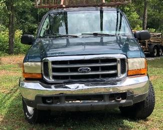 Lot # 40 $5500 ~ Ford F250 '99 4X4 - 4 wheel drive/285K miles Hide Away hitch and Gooseneck hitch with work racks, gas (sorry TRUCK not discounted)