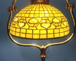 076 -Tiffany bronze floor lamp with bell leaded shade, signed on shade and on foot of lamp, 58 in. T, shade is 12 in. Dia., 6 in. T.