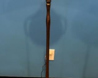 078 - Signed Tiffany bronze floor lamp, with art glass green shade, possibly Tiffany shade, signed on foot, 55 in. T, shade is 10 in. Dia., 6 in. T.