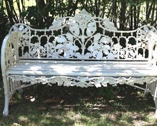 197 - Heavy ornate cast iron bench painted white, 35 in. T, 66 in. W, 20 in. D.
