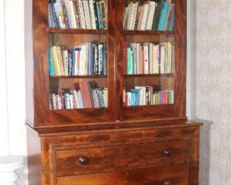060 - Period Empire flame mahogany bookcase with 3 drawers and original wood pulls, 8 ft. 3 in. T, 5 ft. W, 20 in. D.