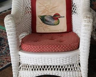 106 - White wicker rocker, 31 in. T, 27 in. W, 20 in. D.