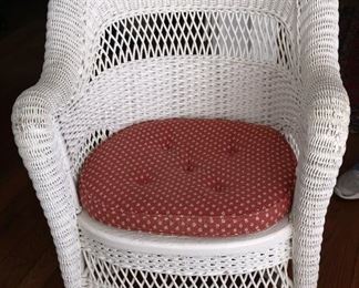 110 - Antique wicker chair in good condition, 35 in. T, 28 in. W, 20 in. D.
