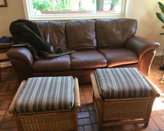 leather couch and storage stools
