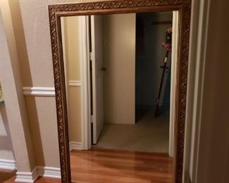 Large gold framed mirror