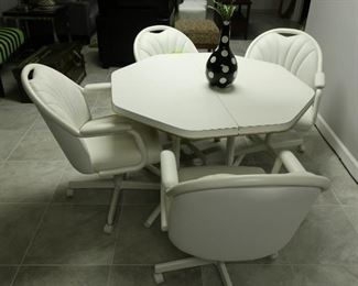 120    chrome craft dinette set (has one leaf)   Price  is  275.00