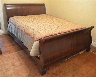 33. Lot F33 (0070.jpg 0071.jpg) Queen Size Wooden Bed by Thomasville Sleigh 98” x 65”. Headboard 44”, Foot Board, Frame. (Cover, Mattress not included).