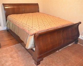 33. Lot F33 (0070.jpg 0071.jpg) - $450.00 – Queen Size Wooden Bed by Thomasville Sleigh 98” x 65”. Headboard 44”, Foot Board, Frame. (Cover, Mattress not included). 