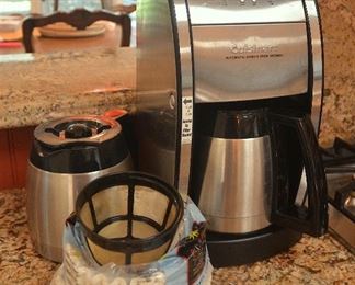 73. Lot E73 (0147.jpg) - – “Cuisinart” Automatic 73. Lot E73 (0147.jpg) - $85.00 – “Cuisinart” Automatic Grind and Brew Thermal Coffee maker with extra pot.Grind and Brew Thermal Coffee maker with extra pot.