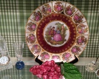 One of several individual china plates