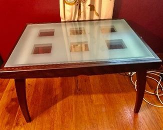 Glass top table .......... that converts to a dining room table