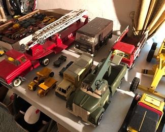 Buddy L, Tonka, Structo and Erte diecast trucks.