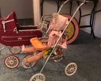 Vintage toy stroller and baby buggy