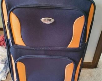 Orange and Black American Uni Suitcase with Wheels
