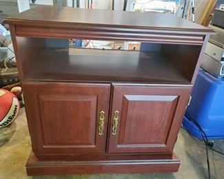 Wooden Cabinet with Lower shelf and Storage. Brass Handles. . and Wheels