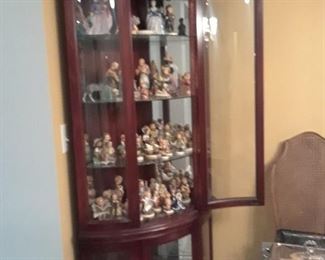 Jasper  Cabinet Company curved glass Display corner cabinet, lighted
