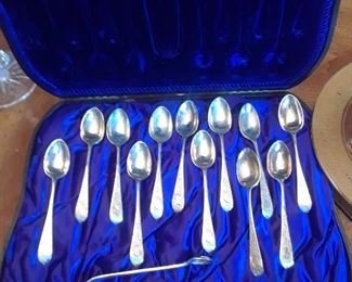 Set of sterling demitasse spoons and tongs