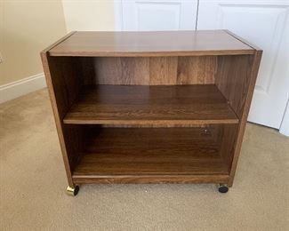 Lot P22, Particleboard Shelf on Casters, $10