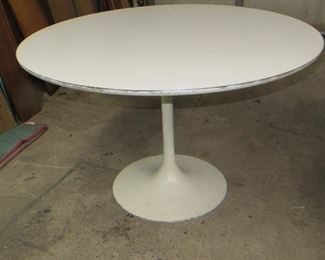 ITEM 5 - Saarinen style tulip base table with laminate top. has  edge wear , paint loss on base. 47 1/2"diameter top 29" high  $250.00