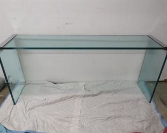 ITEM 7 --Pace chrome and glass console table. Has chipped glass on edge corners under chrome. 62 1/2" long,15" deep, 26 3/4" high. $125.00