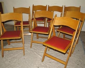 ITEM 21---MCM set of 8 folding chairs with red vinyl seats. 30" high, 17" wide, 19" deep. $200.00