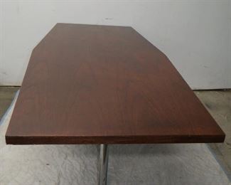 ITEM 23--Large Walnut table with chrome legs. 78 1/4" long, 30" at ends tapered to 36" wide in center, 29" high. has some nicks , scratches. $450.00