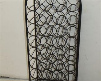 ITEM 42-- Arthur Umanoff style 39 bottle iron wine rack 43" high, 17' wide, 12" deep, some minor rusty spots. $275.00