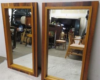 ITEM 49-- Pair MCM rosewood and oak brutalist style mirrors. Marked made in Canada. 61" high, 44" wide. $450.00